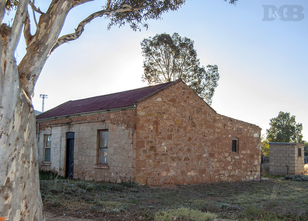 Artists reference photo of an old stone house beside a gumtree